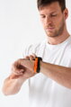 Correa deportiva premium del Apple Watch Negro/Naranja