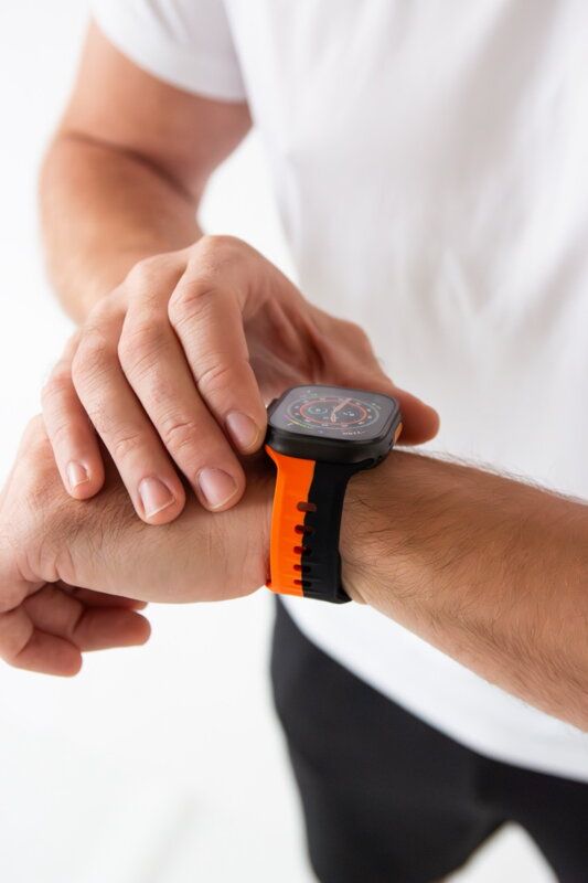 Correa deportiva premium del Apple Watch Negro/Naranja